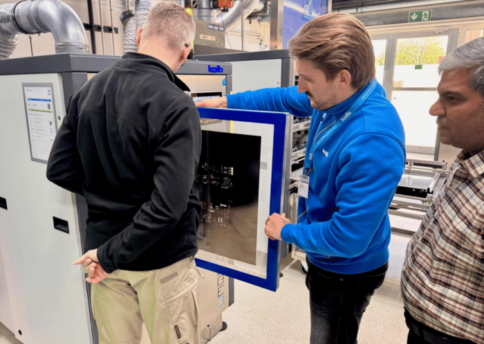 kolb Campus participants loading a machine