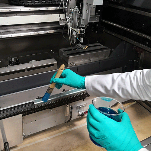 Photo: sealing of machine parts prior the coating process